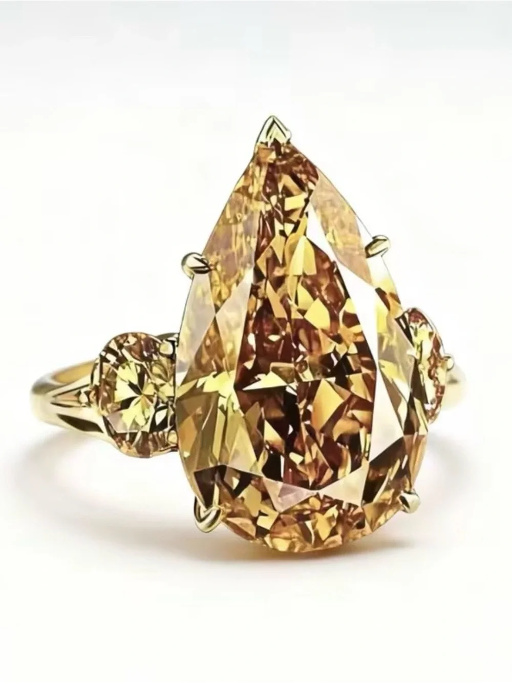 Pear-Shaped Citrine Three-Stone Ring in Golden Yellow